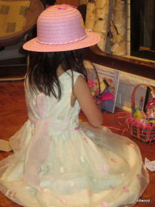 Elspeth got dolled up for baskets and egg hunt complete with an Easter bonnet.